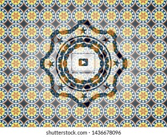 video player icon inside arabesque emblem background. arabic decoration.