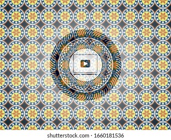 video player icon inside arabesque badge. arabic decoration.