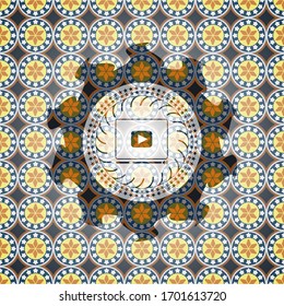 video player icon inside arabesque emblem background. arabic decoration.