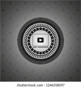 video player icon inside black emblem