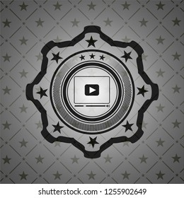 video player icon inside black emblem. Vintage.