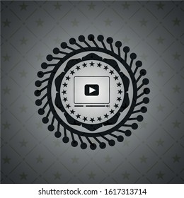 video player icon inside black emblem