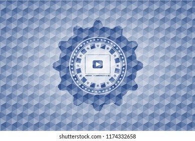 video player icon inside blue polygonal badge.