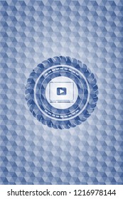 video player icon inside blue polygonal badge.