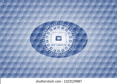 video player icon inside blue badge with geometric background.