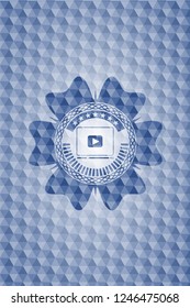 video player icon inside blue emblem with geometric pattern background.