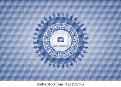 video player icon inside blue emblem with geometric background.