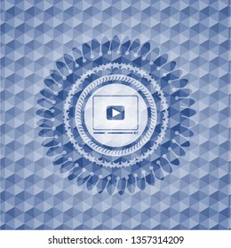 video player icon inside blue polygonal badge.