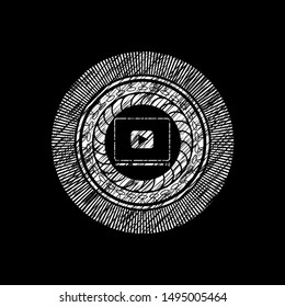 video player icon inside chalkboard emblem written on a blackboard