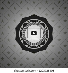 video player icon inside dark emblem. Retro