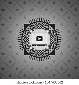 video player icon inside dark emblem. Retro