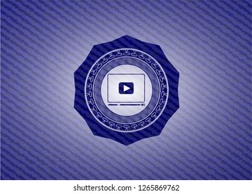 video player icon inside emblem with jean high quality background