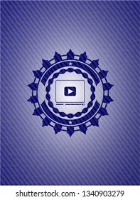 video player icon inside emblem with jean high quality background