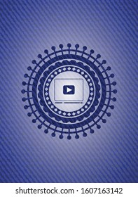 video player icon inside emblem with denim high quality background