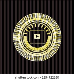 video player icon inside gold emblem