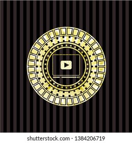 video player icon inside golden emblem