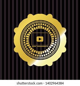 video player icon inside golden badge or emblem