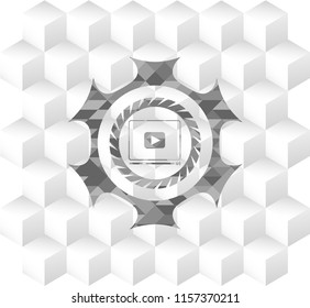 video player icon inside grey icon or emblem with geometric cube white background