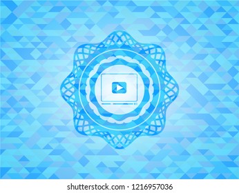 video player icon inside light blue mosaic emblem