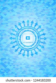 video player icon inside light blue emblem with mosaic background