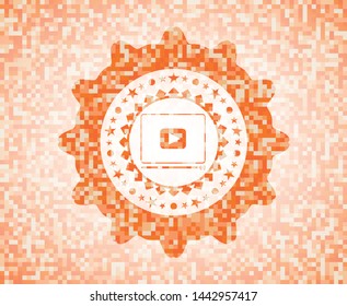 video player icon inside orange mosaic emblem