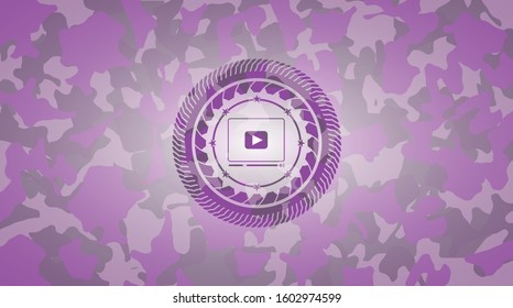 video player icon inside pink camouflage emblem