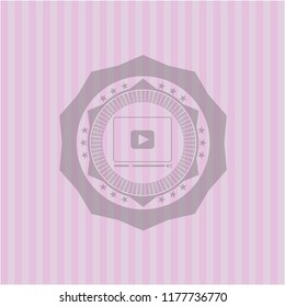 video player icon inside realistic pink emblem