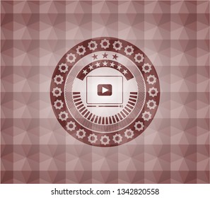video player icon inside red emblem or badge with abstract geometric polygonal pattern background. Seamless.