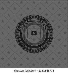 video player icon inside retro style black emblem