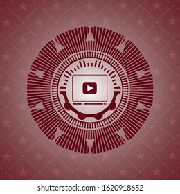 video player icon inside retro style red emblem