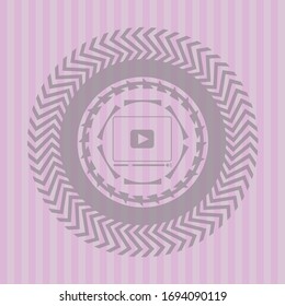 video player icon inside retro pink emblem