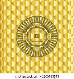 video player icon inside shiny golden emblem. Scales pattern. Vector Illustration. Detailed.