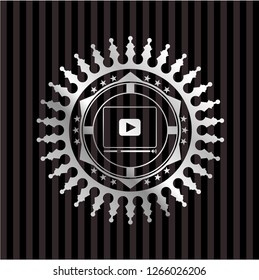 video player icon inside silver emblem
