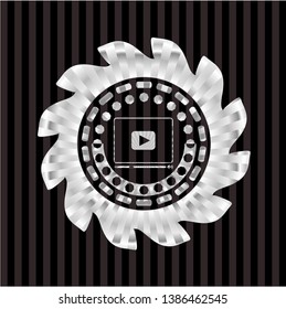video player icon inside silver shiny emblem
