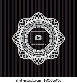 video player icon inside silver emblem