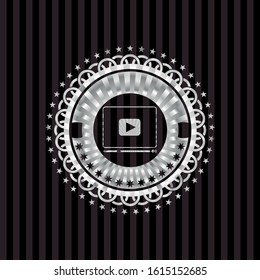 video player icon inside silver shiny badge