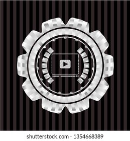 video player icon inside silvery shiny emblem