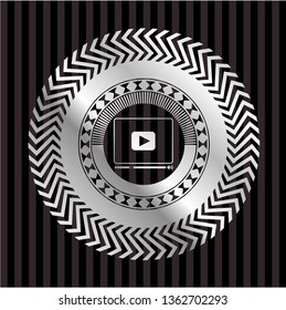 video player icon inside silvery emblem or badge