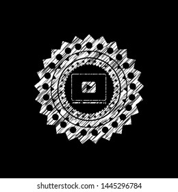 video player icon on chalkboard