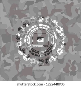 video player icon on grey camo texture