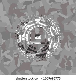 video player icon on grey camo pattern. 
