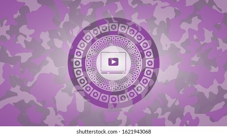 video player icon on pink and purple camo pattern