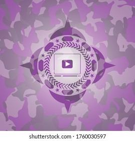 video player icon on pink camouflaged texture. 