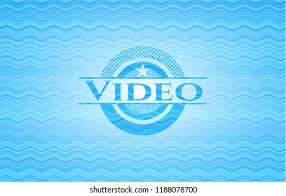 Video sky blue water wave style badge.