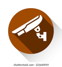 Video surveillance, camera on a brown circle