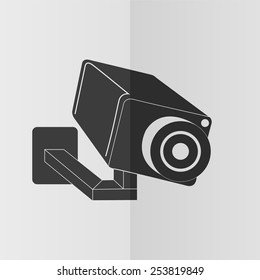 Video surveillance camera vector icon. Effect of folded paper. Flat design