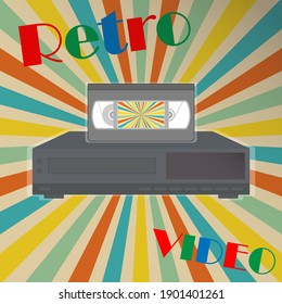 Video tape on a video player with the text “retro video”