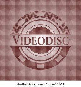 Videodisc red emblem with geometric pattern background. Seamless.