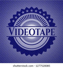 Videotape emblem with jean texture