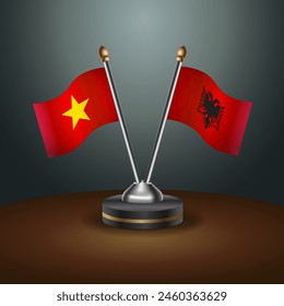 Banderas de mesa de Vietnam y Albania en relación con el fondo de gradiente. Ilustración vectorial